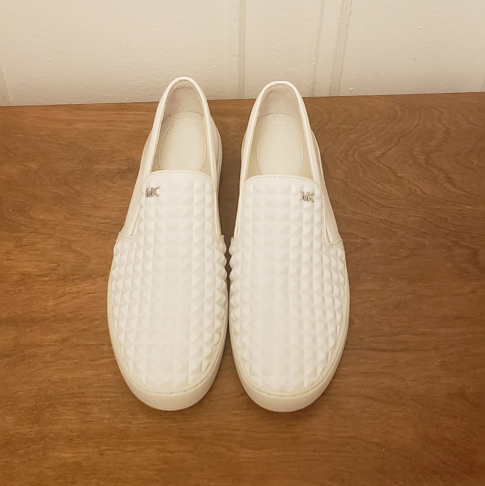White leather shoes. Michael Kors